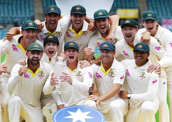 Australia's Steve Smith and team-mates celebrate winning The Ashes at Sydney Cricket Ground