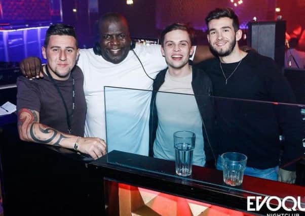 DJ Vince Williams with the young DJs he trained at Evoque nightclub. Left to right: Anthony Fisher, Vince Williams, Isaac Holden, James Fisher