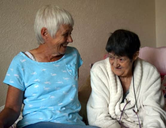 St Catherine's Hospice volunteer befriender Pat Nagle with befriendee Viv Watmough