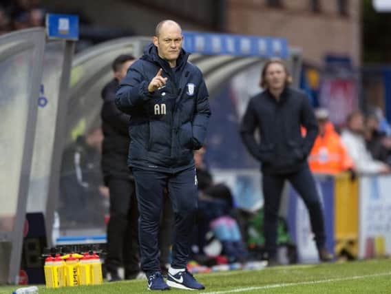 Alex Neil dishes out instructions during the win at Wycombe.