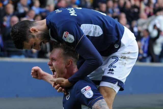 Millwall winger Aiden OBrien is congratulated by Conor McLaughlin