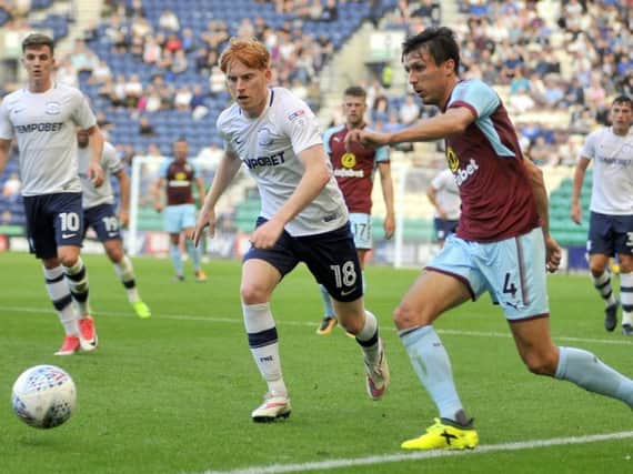 Ben Pringle competes with Burnley's Jack Cork in July's pre-season friendly