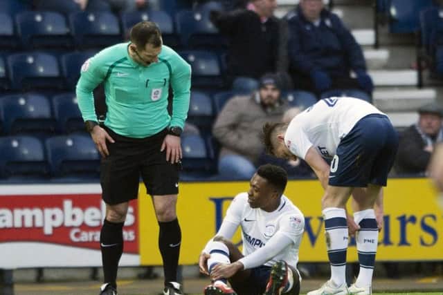Darnell Fisher was injured against Sheffield United in December