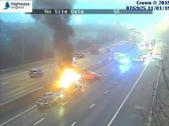 The car was well alight on the motorway