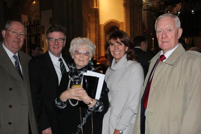 Guests at Derian House's fund-raiser Lights of Love in 2016, with Miss Margaret Vinten MBE, founder of Derian House, and Georgina Cox centre