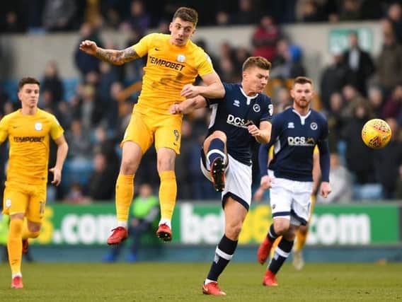 Jordan Hugill challenges for possession at The Den on Saturday.