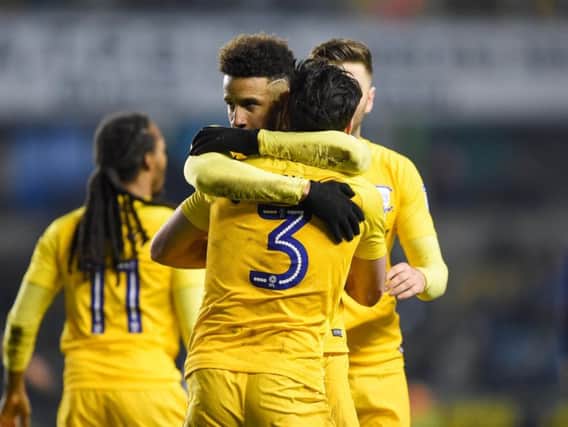 Callum Robinson and Greg Cunningham embrace after PNE's equaliser at The Den.