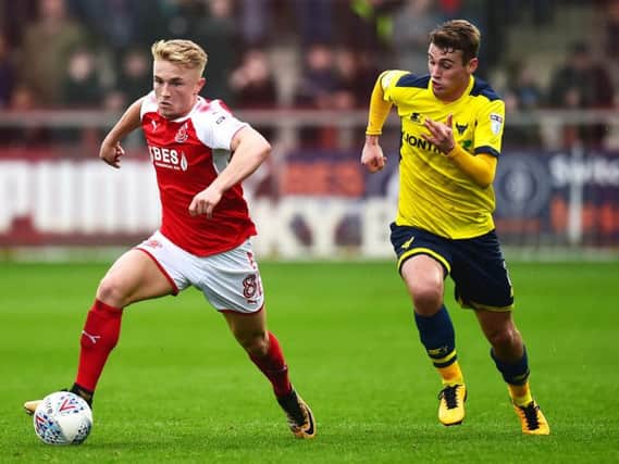 Ryan Ledson (right) in action for Oxford United against Fleetwood earlier this season