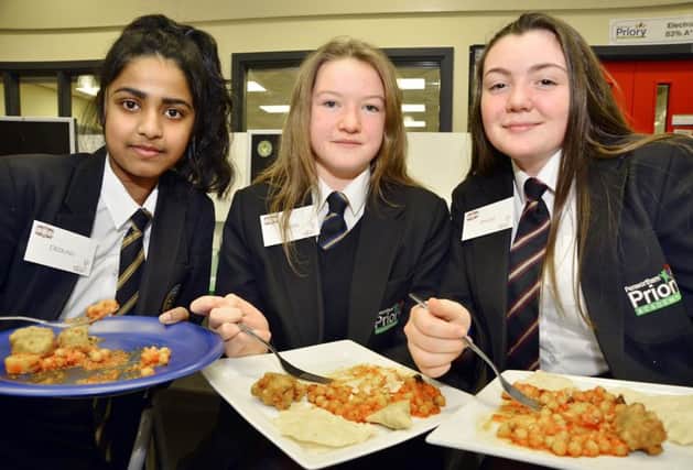 Tasty treats... testing the dishes served up as part of the Indian Cuisine event at Priory Academy
