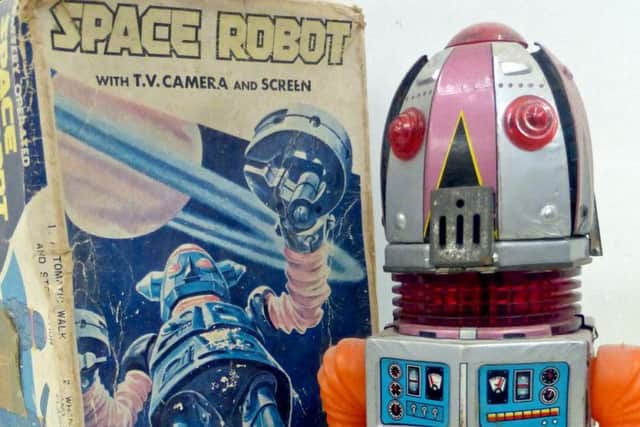 A space robot, one of more than 200 toy robots dating back to the 1960s