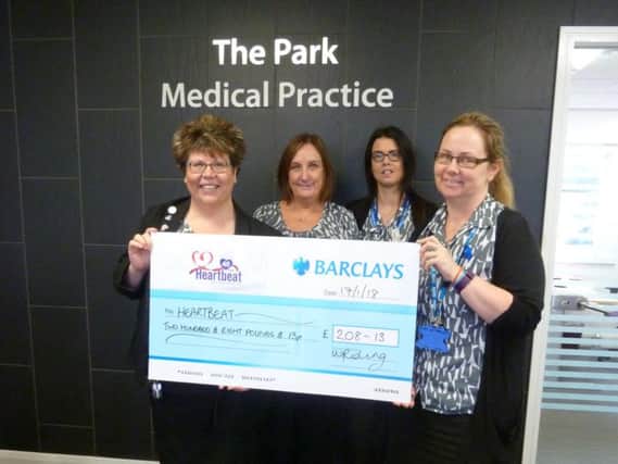 Nicky Holland, Jacqui Kirby, Dawn Bryans, Suzanne Jacob, of The Park  Medical Practice present a cheque to Heartbeat