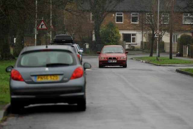 Traffic calming on Larches Lane in Ashton where speed cushions were put in havent worked, according to residents as drivers are going through the middle of the humps, or straddling them