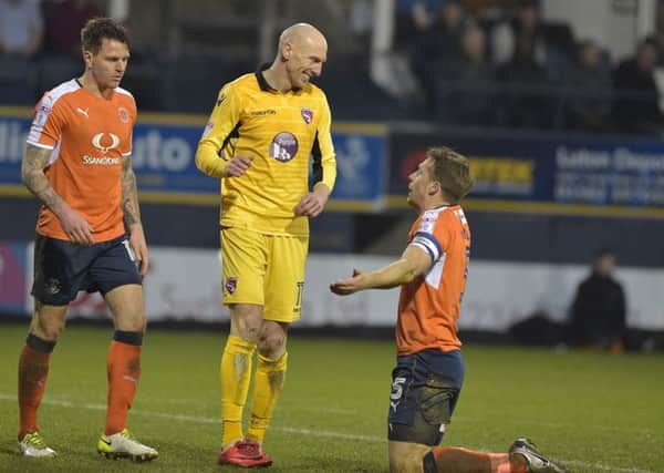 Kevin Ellison in action against Luton (photo: B&O Press)
