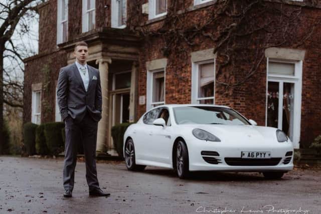 Jonathan Meek with the sports car he travelled in to his wedding.