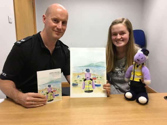 Sgt Adie Knowles from Morecambe Police pictured with illustrator Hannah Robinson, who drew the front cover for the popular Inspector Ted book. Inspector Ted was a knitted soft toy lost by a child near the Venus and Cupid statue in Morecambe and despite many appeals, the owner was never found. Sgt Adie Knowles wrote a book about Inspector Ted's adventures to raise money for local charity Unique Kidz and Co, and Hannah's entry was chosen from many others to become the front cover illustration for the book.