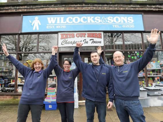 Staff at hardware store Wilcocks & Sons celebrate its 140th year. Pictured L-R are Deborah Tomlinson, Valerie Booth, Adam Williams and Arthur Adlam.