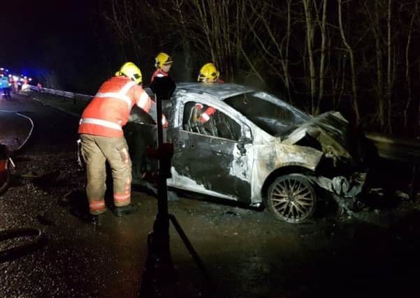 The burned out car. Photo courtesy of Lancs Road Police.