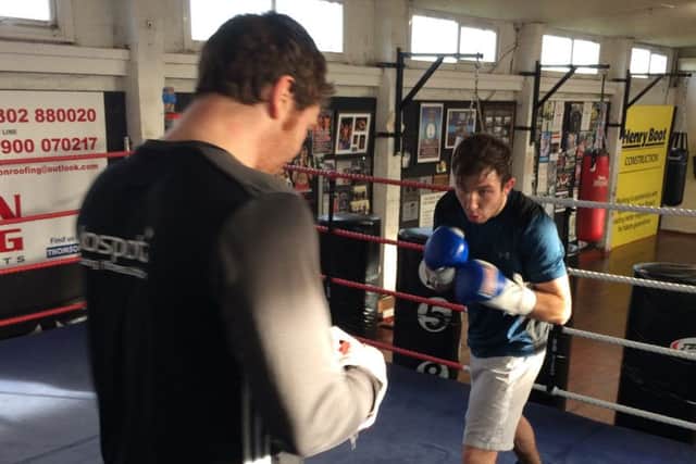 Isaac Lowe in training with Jimmy Harrington in Doncaster.