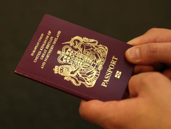 Passport applications will cost more in the post than online for the first time under Government proposals.