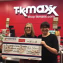 Claire Miller (centre) with TK Maxx frontline controller Ilona Lipczyska, (right),  handing over the cheque to Rosemere Cancer Foundations trust and corporate fundraising manager Cathy Skidmore (left).