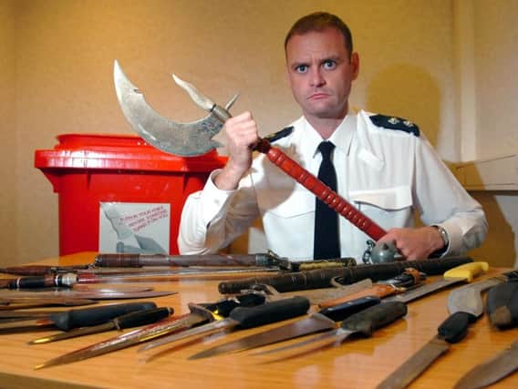 Chief Insp Steve Sansbury with knives recovered during a recent amnesty