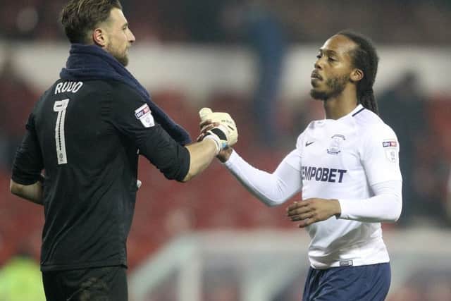 Preston goalkeeper Declan Rudd celebrates with Daniel Johnson after the 3-0 win at Nottingham Forest