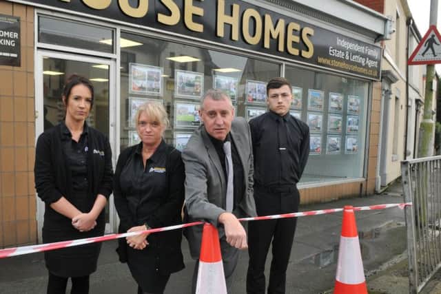 Mark Rushe of Stonehouse Homes Estate & Letting Agents, with Marie Lamb, Karen Rushe and James Ashurst, concerned that traffic barriers have not been replaced outside the business