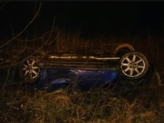 The pictures, tweeted by North West Motorway Police, show a Mini which came off the road