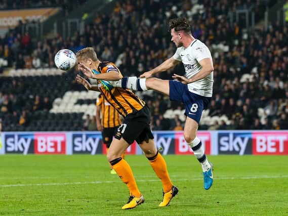 Alan Browne challenges Michael Dawson in the game between the sides at the KCOM Stadium.