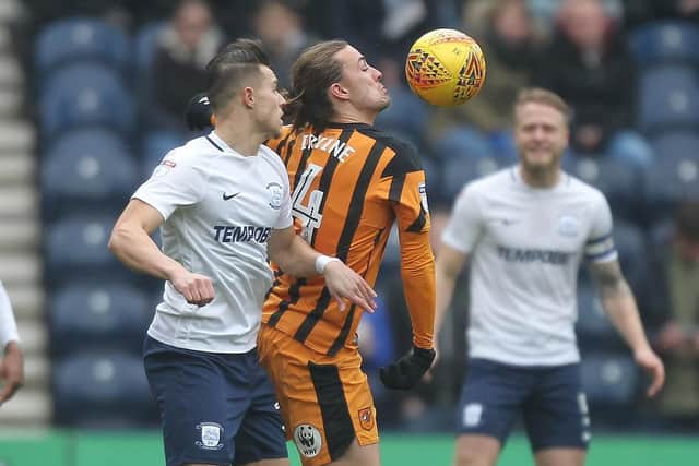 Billy Bodin challenges for the ball