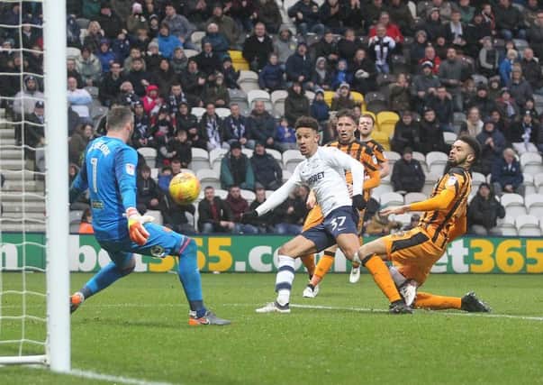Preston striker Callum Robinson forces a good save from Hull goalkeeper Allan McGregor at Deepdale