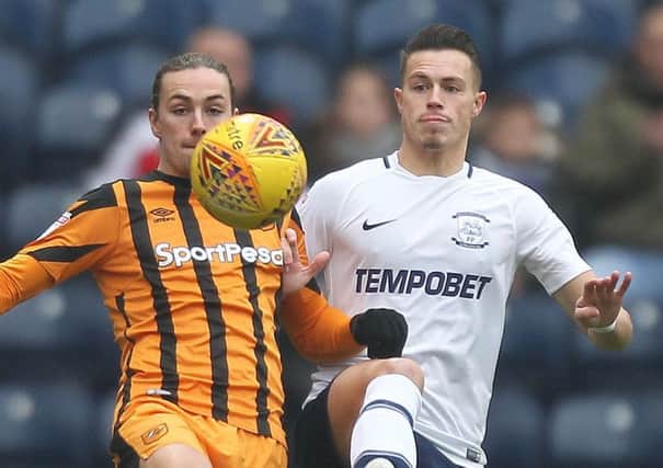 Billy Bodin battles with Hull City's Jackson Irvine