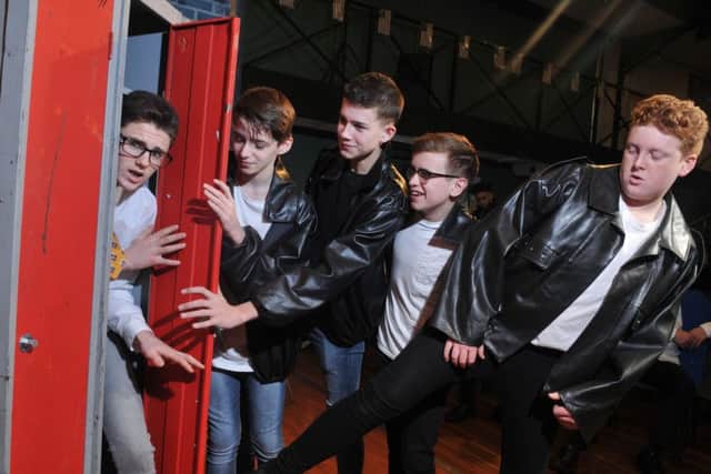 Photo Neil Cross
Grease at All Hallow RC High, Penwortham
Locker scene is Eugene and the T Birds