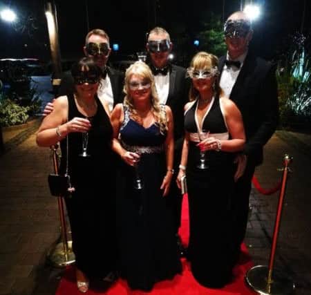 Members of Gregson Green enjoy masquerade fun at Leyland Hallmark Hotel