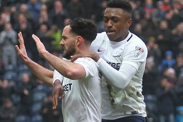 Greg Cunningham celebrates his goal against Hull with Darnell Fisher
