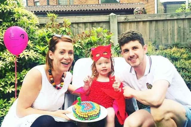 Roisin Pelan, 36, from Ashton, who is battling cancer for the second time in four years, with daughter Ivy three and partner Matthew