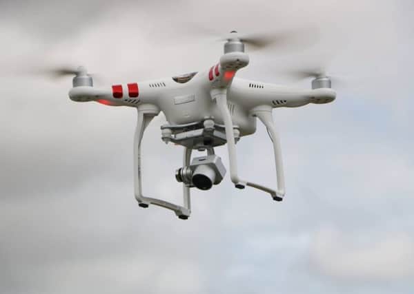 A DJI quadcopter drone in use for training to clear land mines in Cambodia, a project UCLan has been pioneering