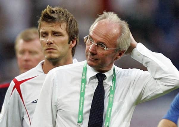 England coach Sven-Goran Eriksson and David Beckham look dejected after losing against Portugal in the quarter-finals of the 2006 World Cup in Germany