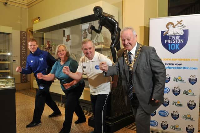Mayor and mayoress of Preston, Coun Brian and Trisha Rollo, with Graham Jackson and Kevin Harmer announcing the Preston 10k is coming back