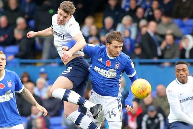 The Cumbrian Cannavaro competes with Joe Garner during PNE's defeat at Ipswich, one of four in a row earlier in the season.