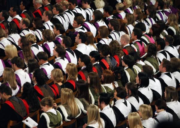 File photo dated 27/06/08 of students at a University graduation ceremony, as the number of people applying to university has dropped for the second year in a row. PRESS ASSOCIATION Photo. Issue date: Monday February 5, 2018. New figures show that just over 5,000 fewer people - about 0.9% - applied to start degree courses this autumn by January 15, compared to the same point last year. See PA story EDUCATION Students. Photo credit should read: David Cheskin/PA Wire