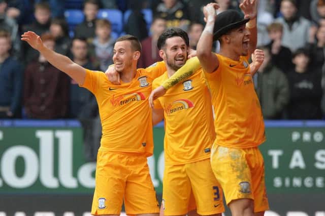 Callum Robinson dons a bowler hat to celebrate setting up PNE's equaliser at Bolton in 2016