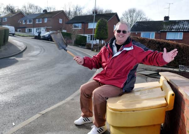 Photo Neil Cross Jeff McGinty on the empty grit bin.