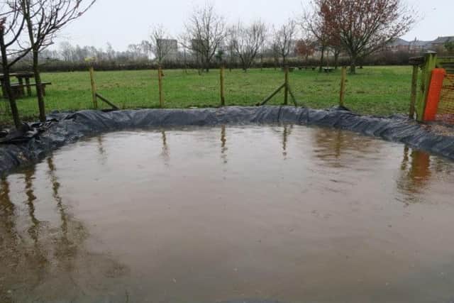 The pond filled up with water from the River Wyre.
