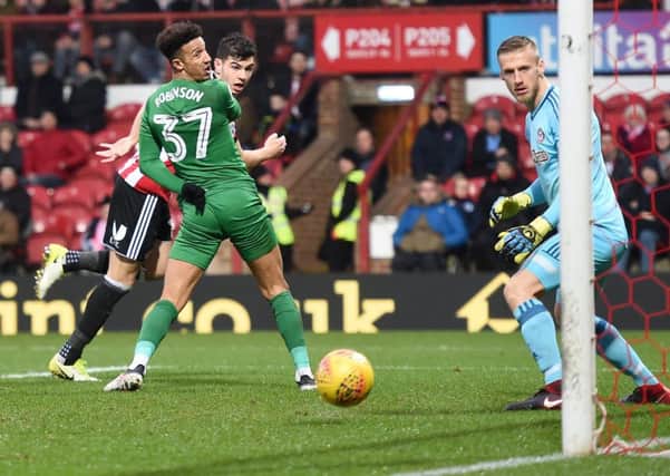 Tom Barkhuizen's cross finds its way into the net
