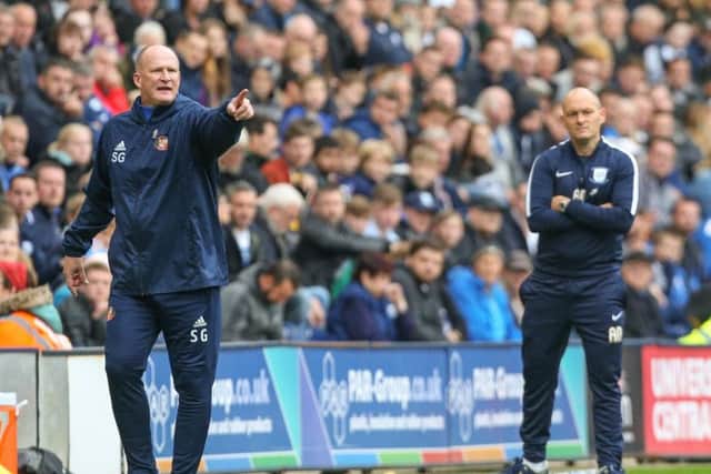 Simon Grayson (left) and Alex Neil (right) when PNE played Sunderland earlier this season