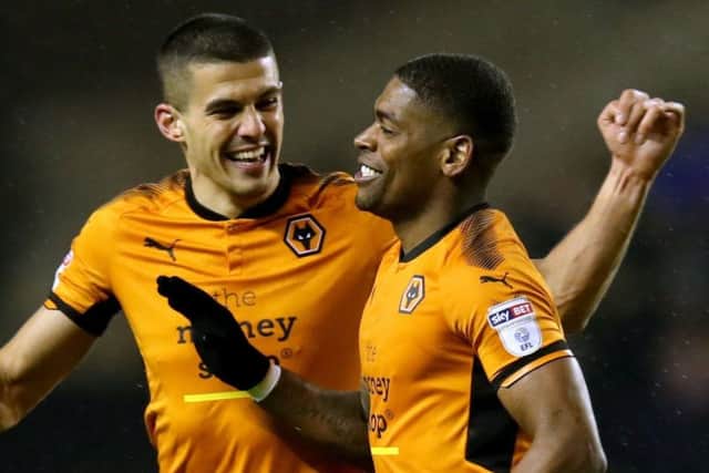 Conor Coady (left) congratulates Wolves' Ivan Cavaleiro after he scored against Sheffield United this month