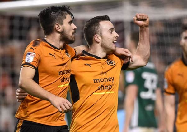 Diogo Jota, right, has been a key figure for Wolves with 12 goals this season.