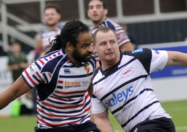 James Fitzpatrick (right) returns at centre for Hoppers