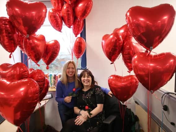 HomeServe staff receive their balloons on Valentines Day